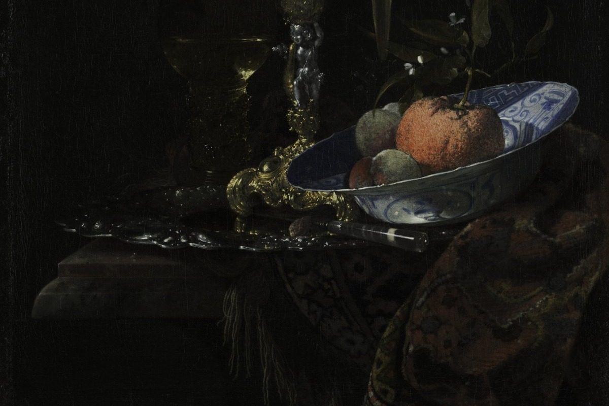 Detail of Willem Kalf's Wineglass and a Bowl of Fruit: a blue and white porcelain bowl, an orange and a gilded goblet stem against a nearly black ground